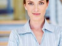 bigstockphoto_Young_Business_Woman_Smiling_C_5616506