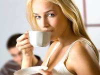 bigstockphoto_Young_Drinking_Woman_With_Cup__2130060