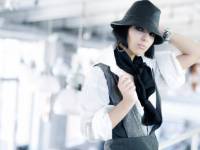 bigstockphoto_Young_Fashion_Woman_With_Hat_5688993